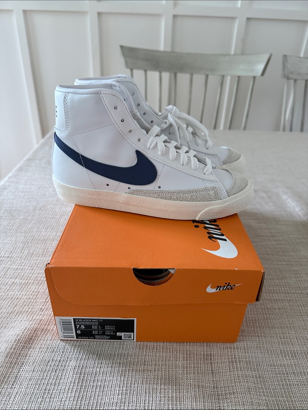 Nike White High-Top Sneakers with Navy Swoosh